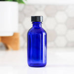 2oz Blue Glass Bottle w/Cap image 0