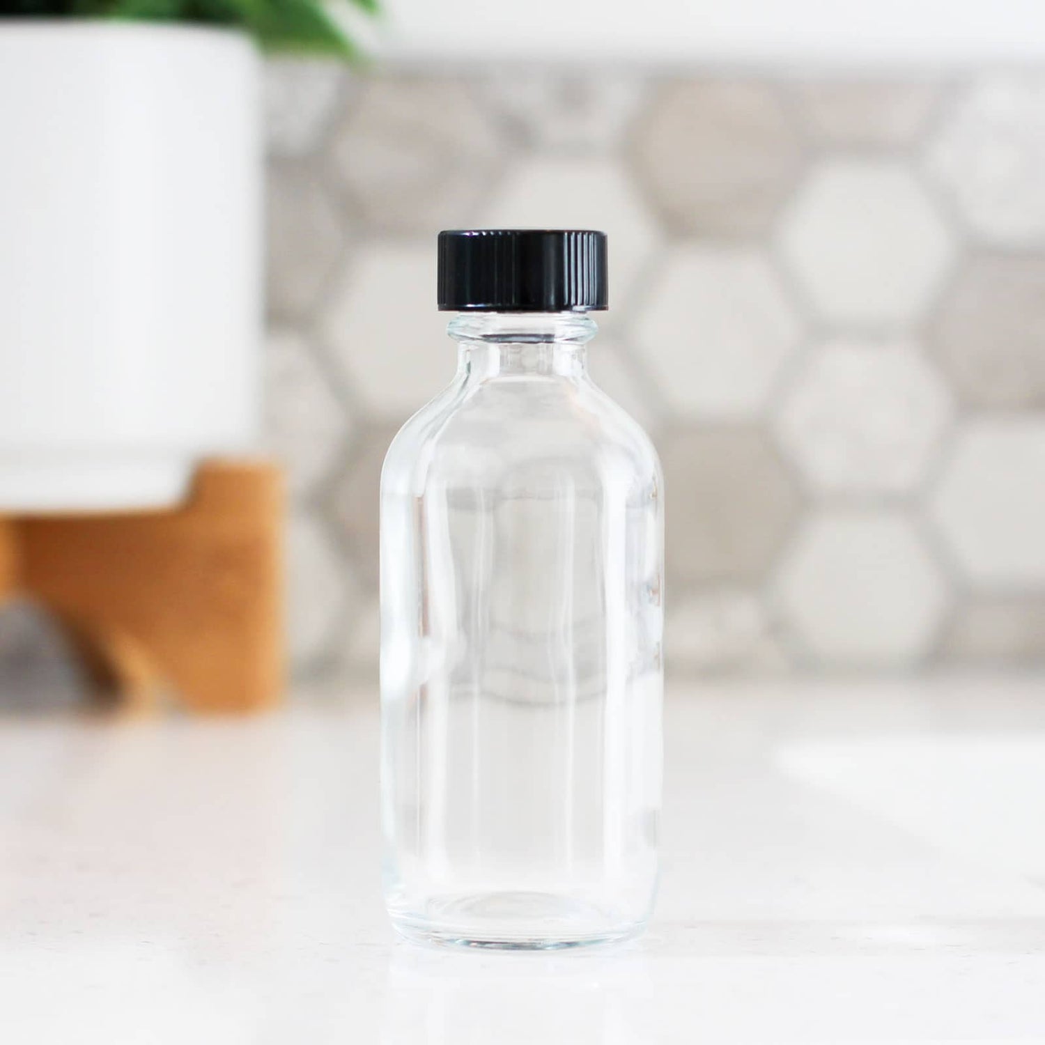 2oz Clear Glass Bottle With Cap image 0