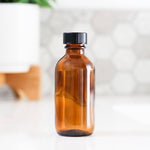 2oz Amber Glass Bottle With Cap image 0