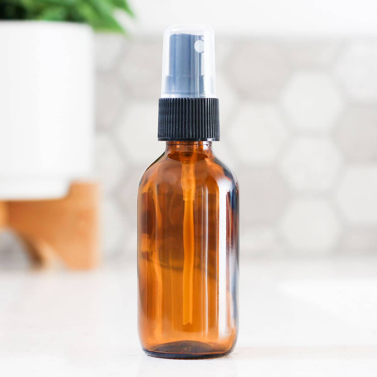 2oz Amber Glass Sprayer Bottle image 0