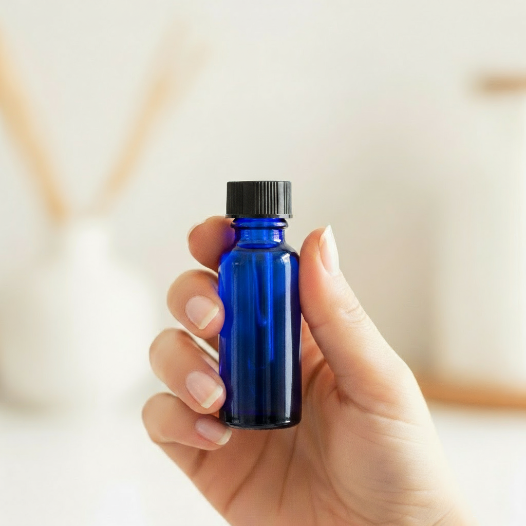 Hand holding 15ml bottle